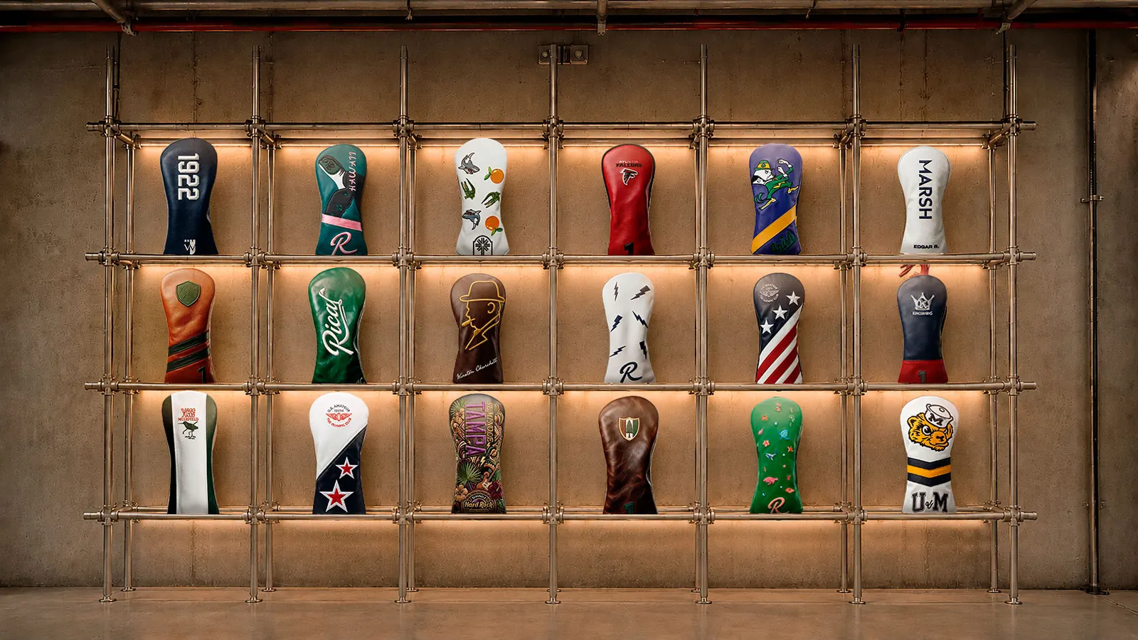Wall display of RICAL leather golf headcovers arranged in a grid